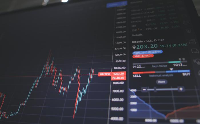 black flat screen computer monitor by Nick Chong courtesy of Unsplash.